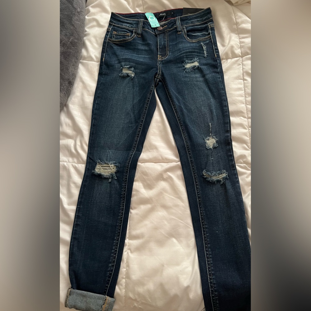 Dark wash, distressed skinny jeans